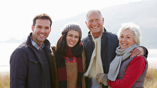 An older couple with their grown children